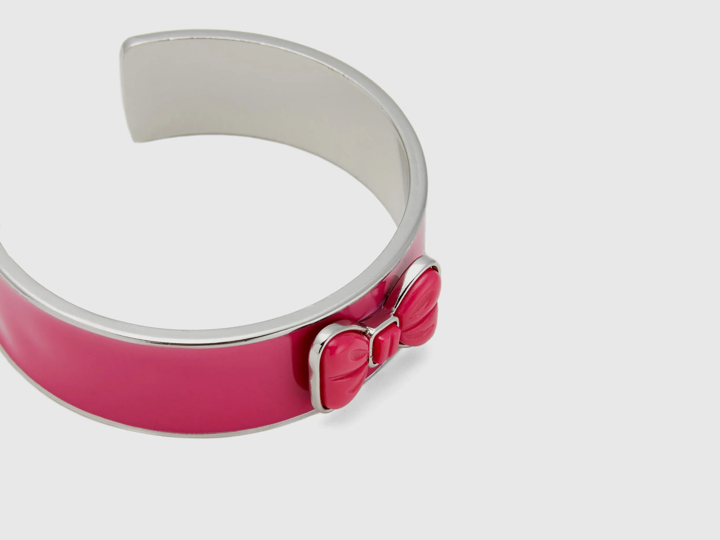 Pulsera bangle fucsia con lazo