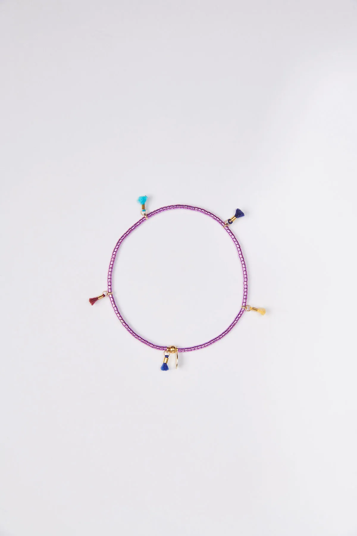 Pulsera violeta de cuentas y borla Lilu Bracelet